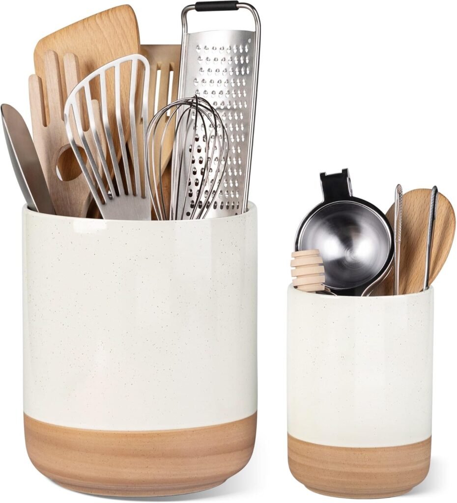 Japandi style two-tone ceramic utensil holders with wooden and metal cooking tools, blending functionality with minimalist design.