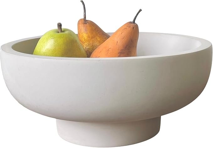 Modern matte pedestal fruit bowl in neutral color, styled with fresh pears for a Japandi kitchen centerpiece.