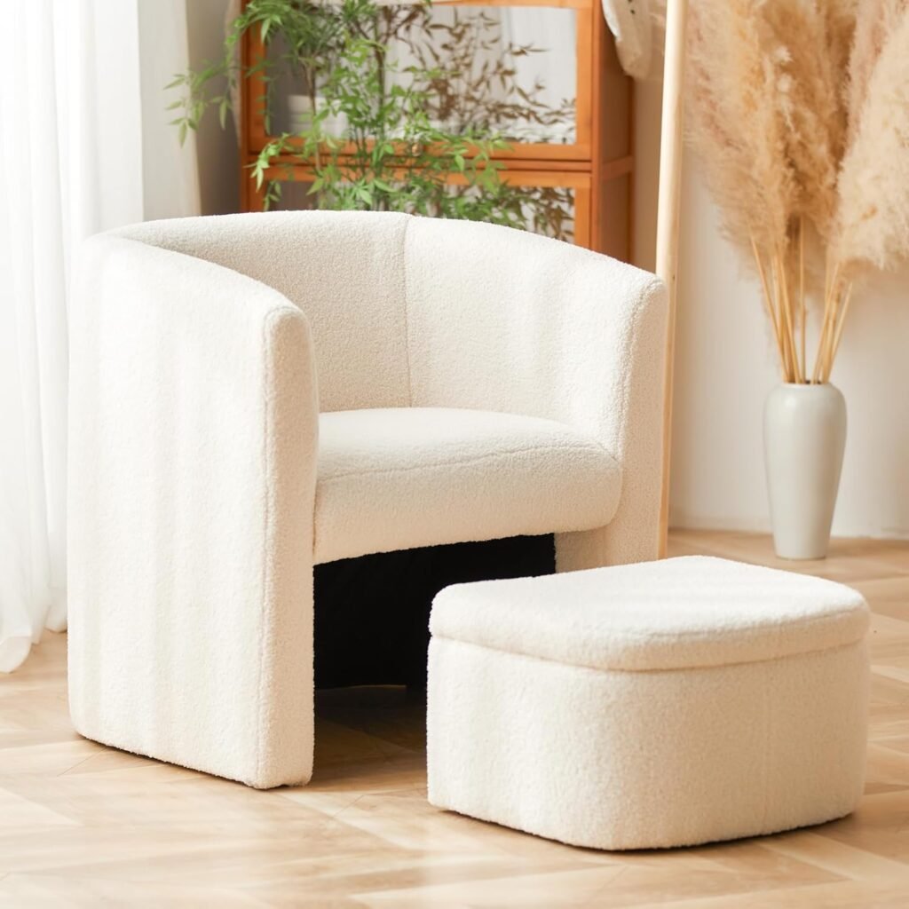 small white bouclé accent chair with matching ottoman in modern living room corner