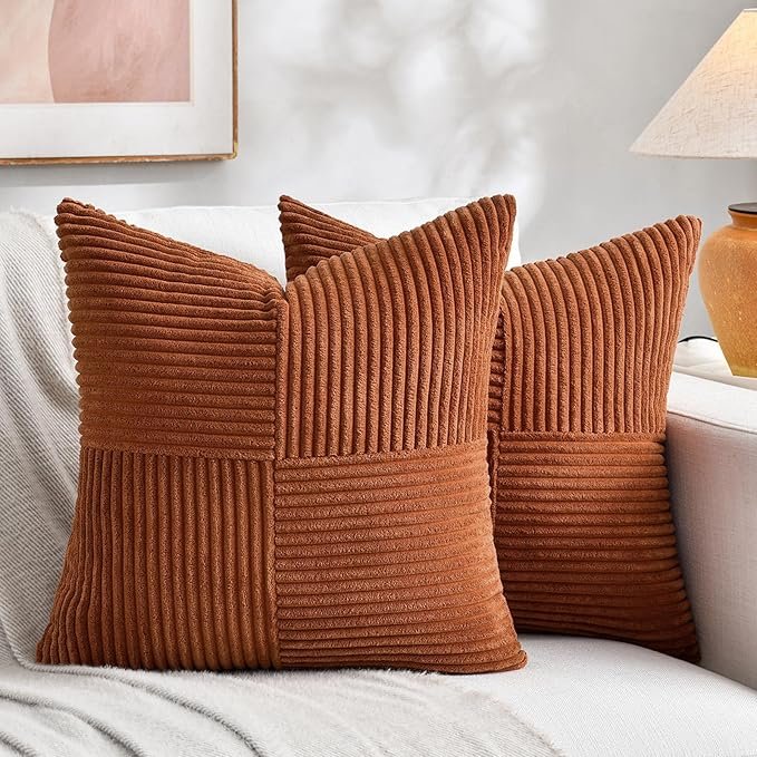 Pair of rust-colored corduroy throw pillow covers on a neutral sofa, adding warm texture for fall.