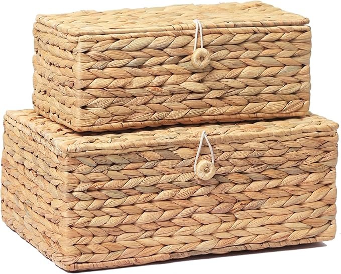 Set of two woven seagrass storage baskets with lids, perfect for Japandi-style storage and organization.