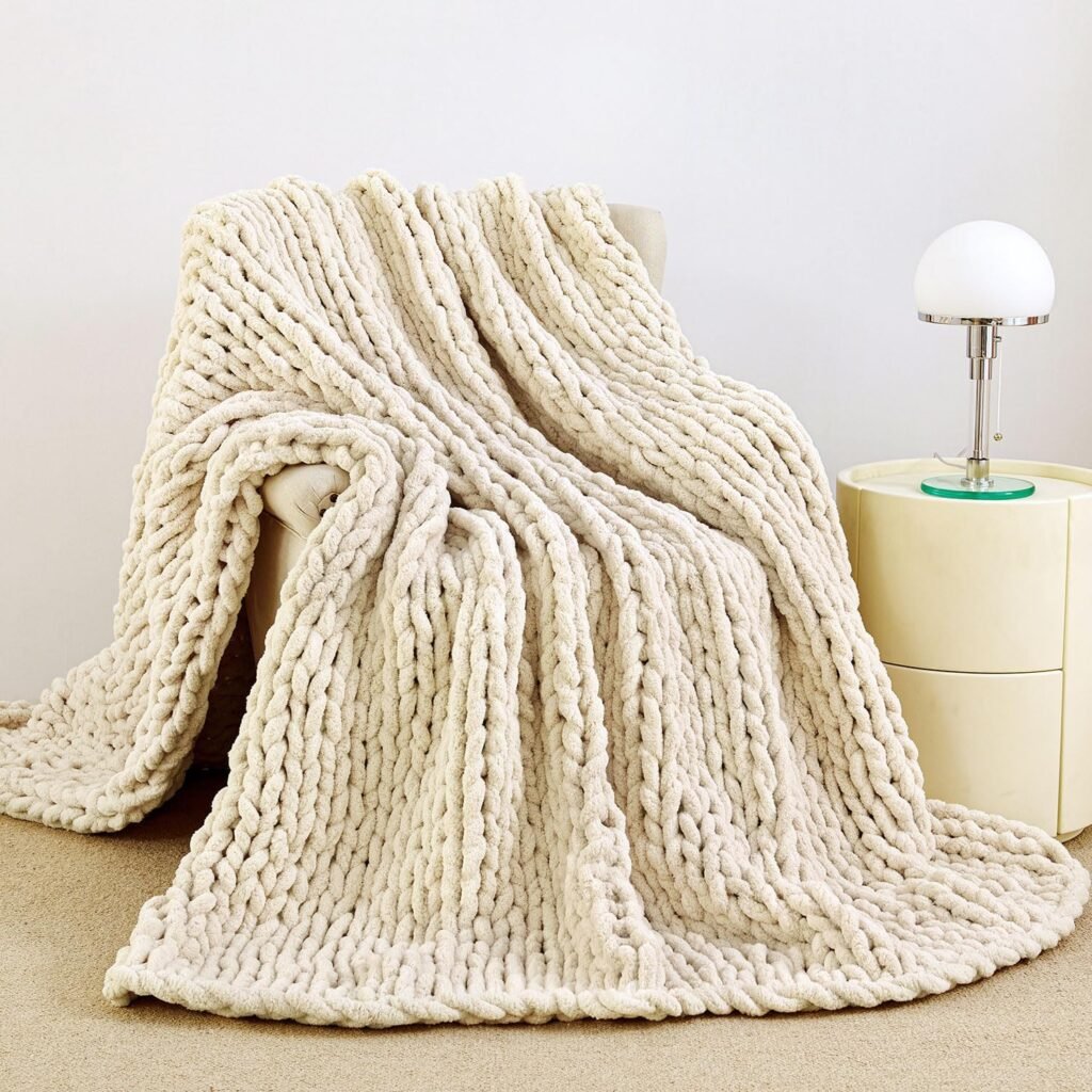 cozy chunky knit throw blanket in cream draped over armchair for organic modern fall decor