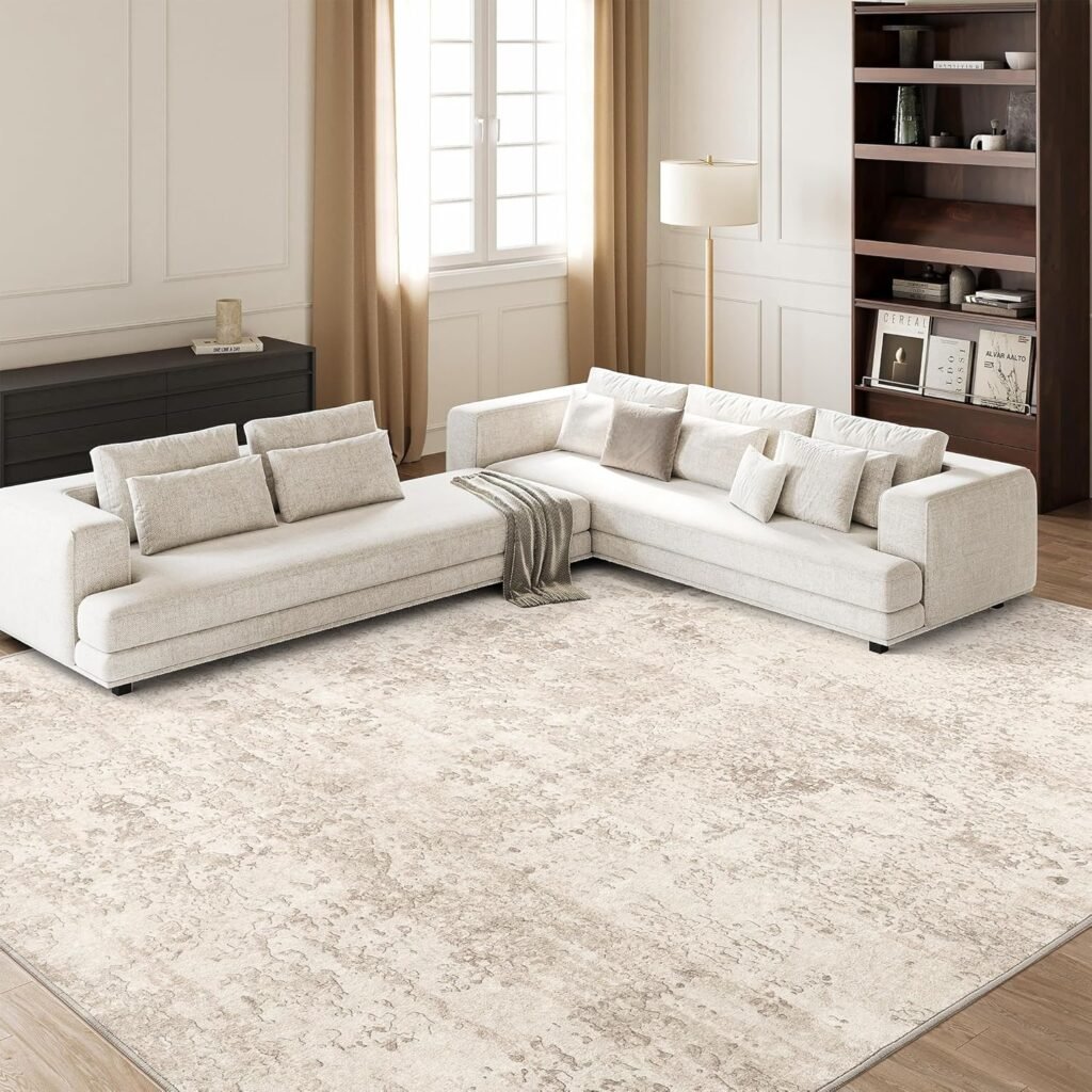 large neutral area rug with subtle texture grounding a modern luxury minimalist living room